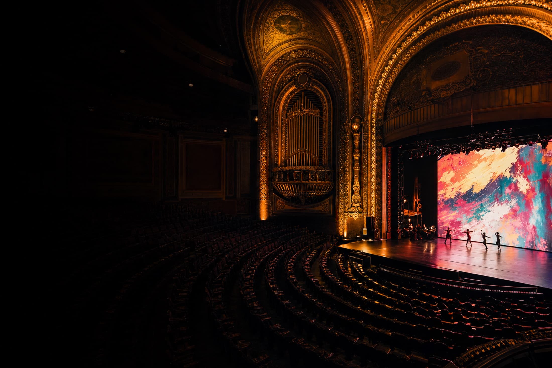 Inside the Coliseum of Art. The 1916 Coliseum Theatre filled with contemporary installations, projected light, and large abstract works in development for Summer 2026